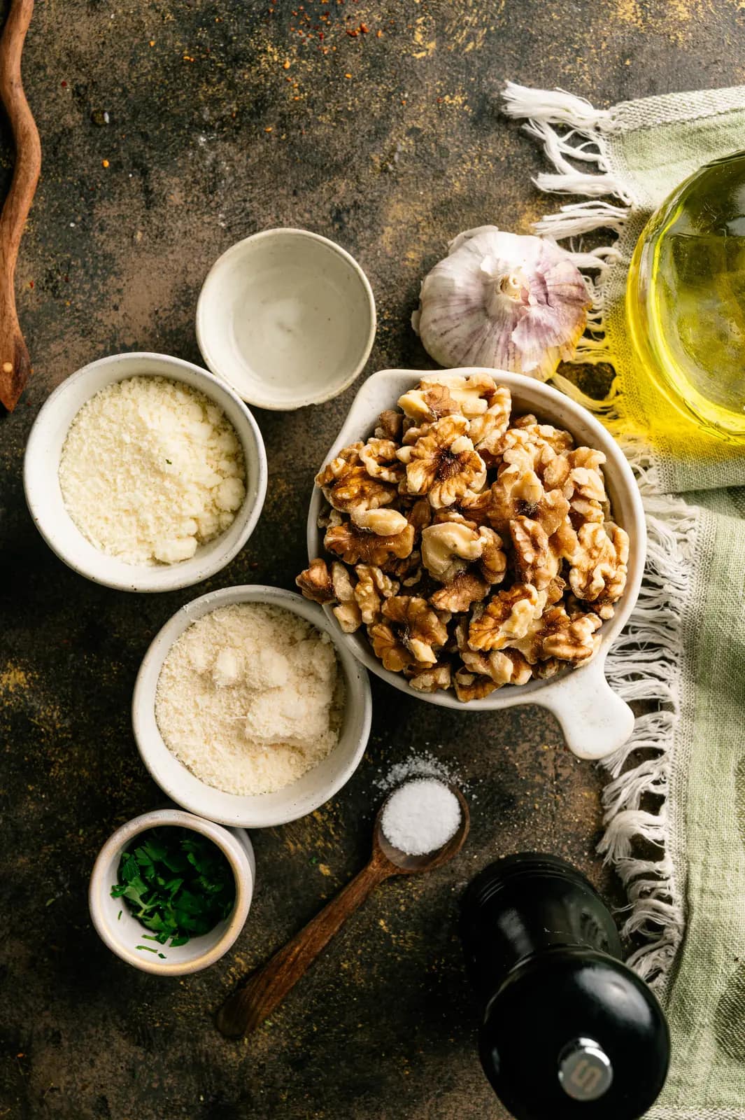 Walnuts, grated Parmesan and Pecorino, garlic, olive oil, and seasonings for Salsa di Noci.