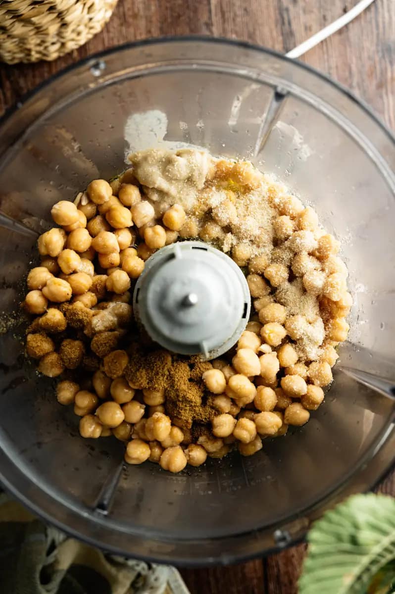 Cooked chickpeas in a food processor for making homemade hummus